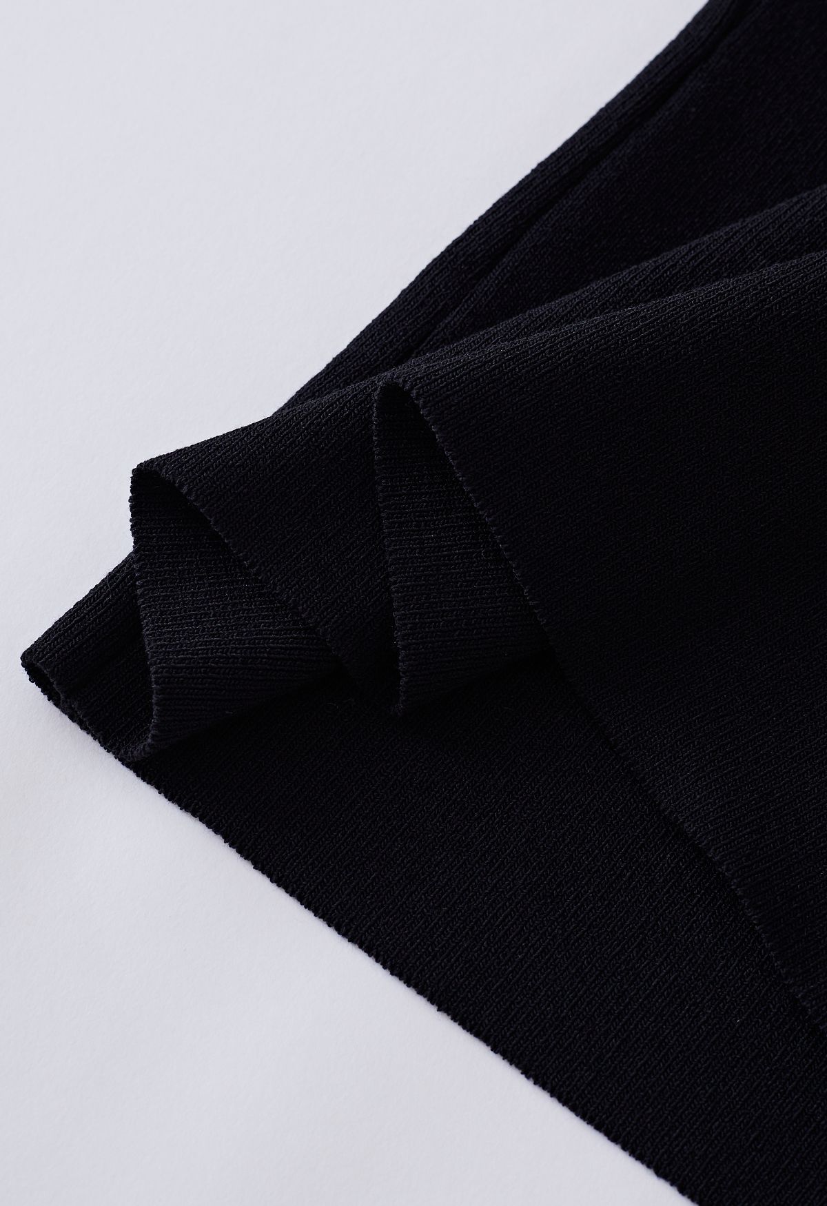 Sassy Wide Ruffled Neckline Knit Top in Black