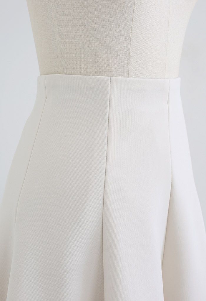 Raw-Cut Hem Flare Mini Skirt in Ivory