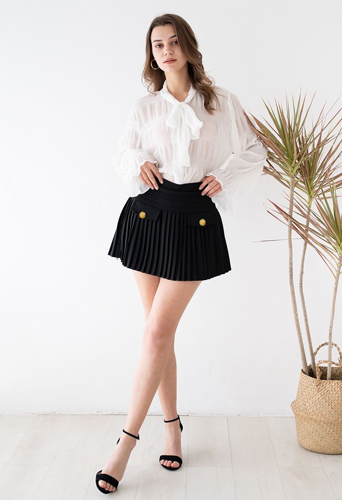 Golden Button Decorated Pleated Mini Skirt in Black