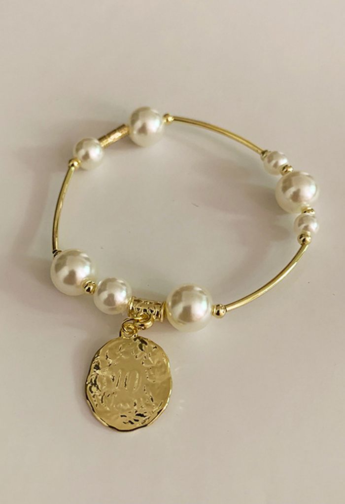 Head Embossed Pearl Gold Bracelet