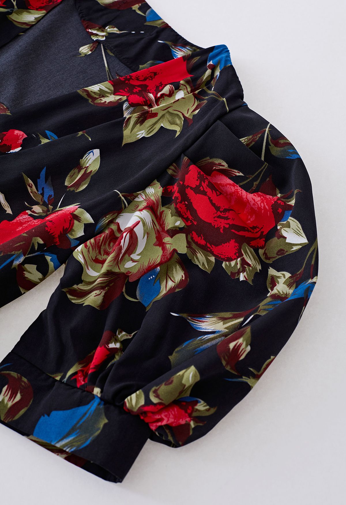 Vibrant Rose Print Asymmetric Wrap Dress in Black