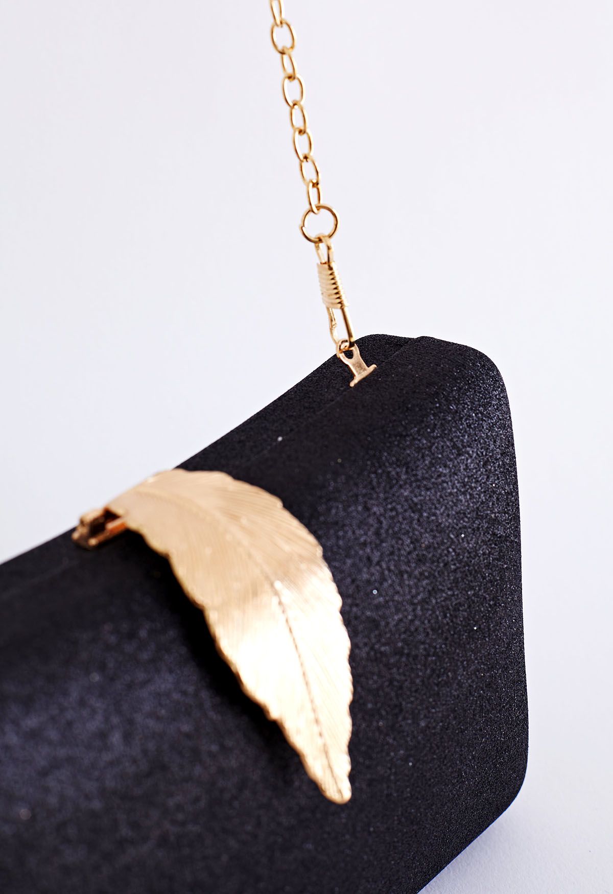 Solid Textured Leaf Clutch in Black