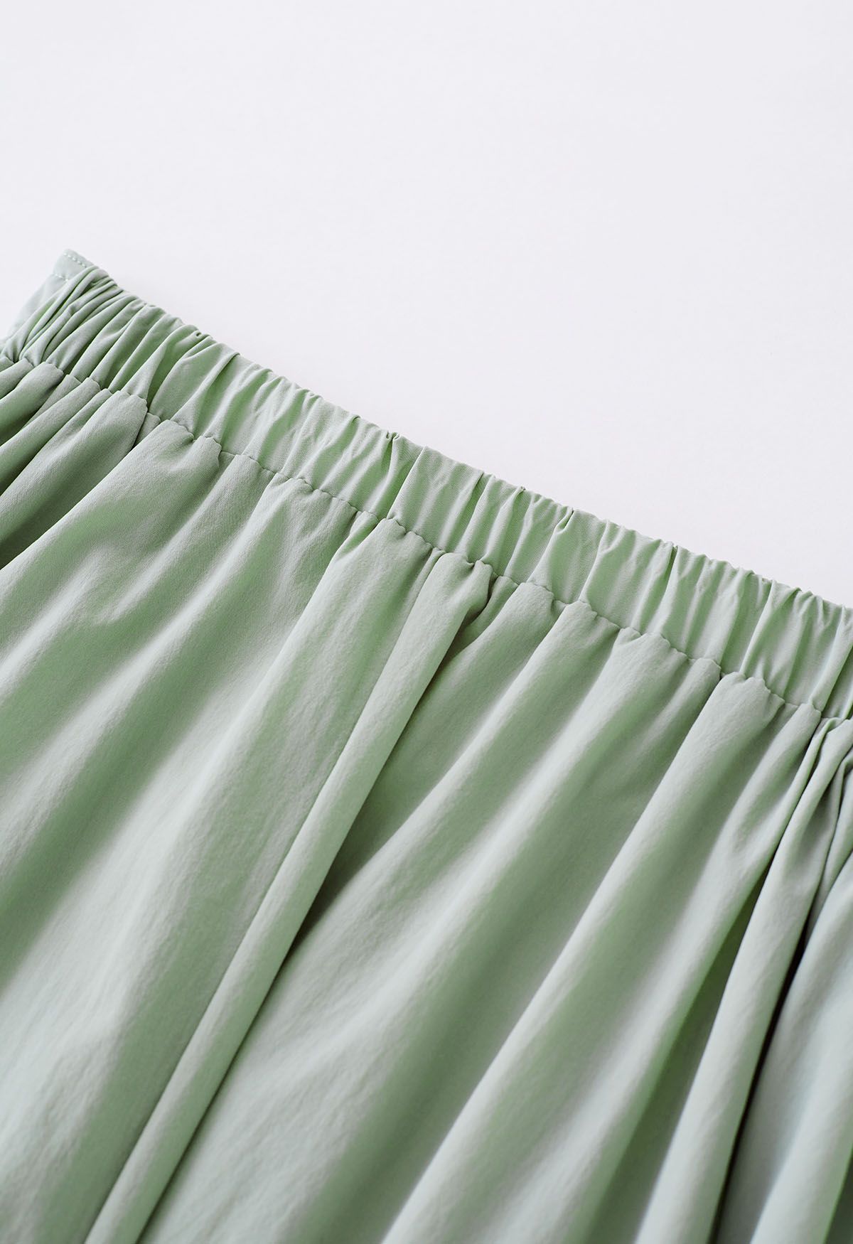 Notched Waist Flare Midi Skirt in Pea Green