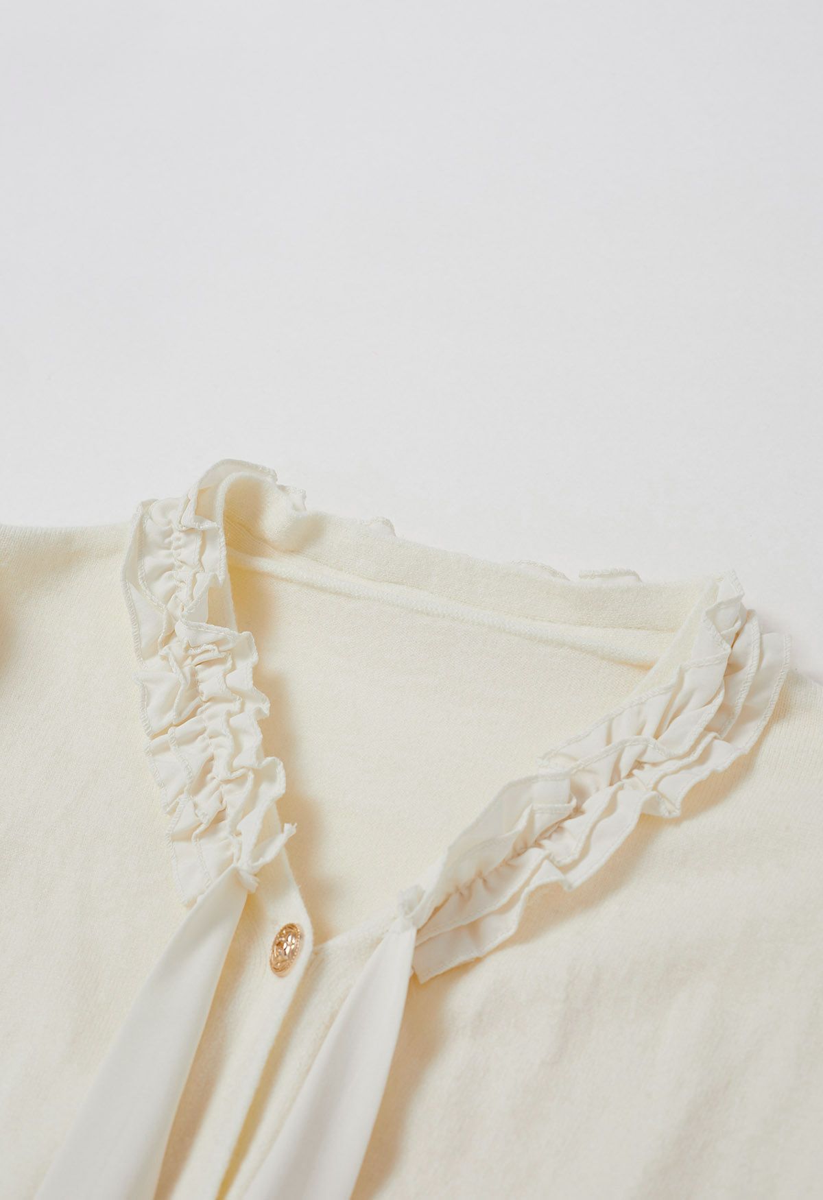Ruffle Tie-Bow Wool-Blend Buttoned Top in Cream