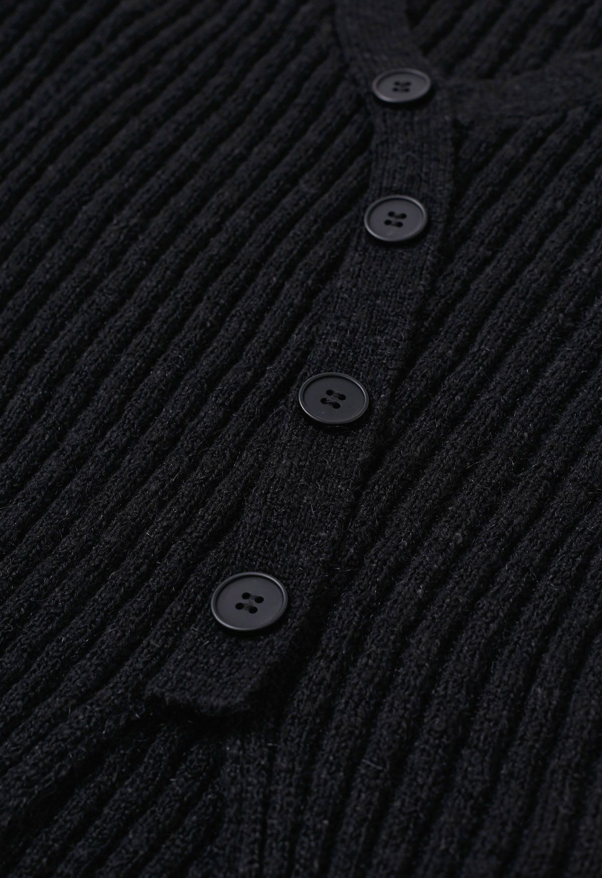 Button Trim Slit Hem Ribbed Knit Top in Black
