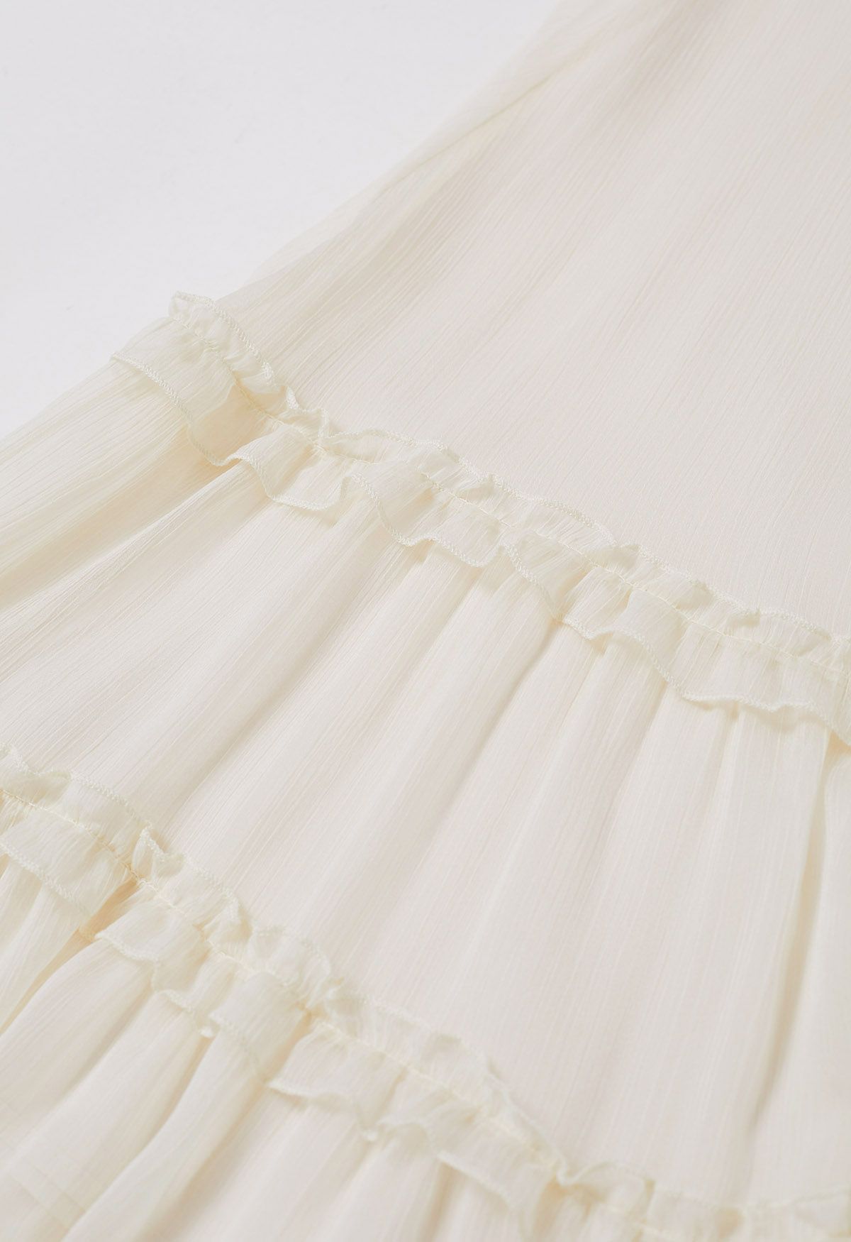 Swirling Ruffle Trim Maxi Skirt in Cream