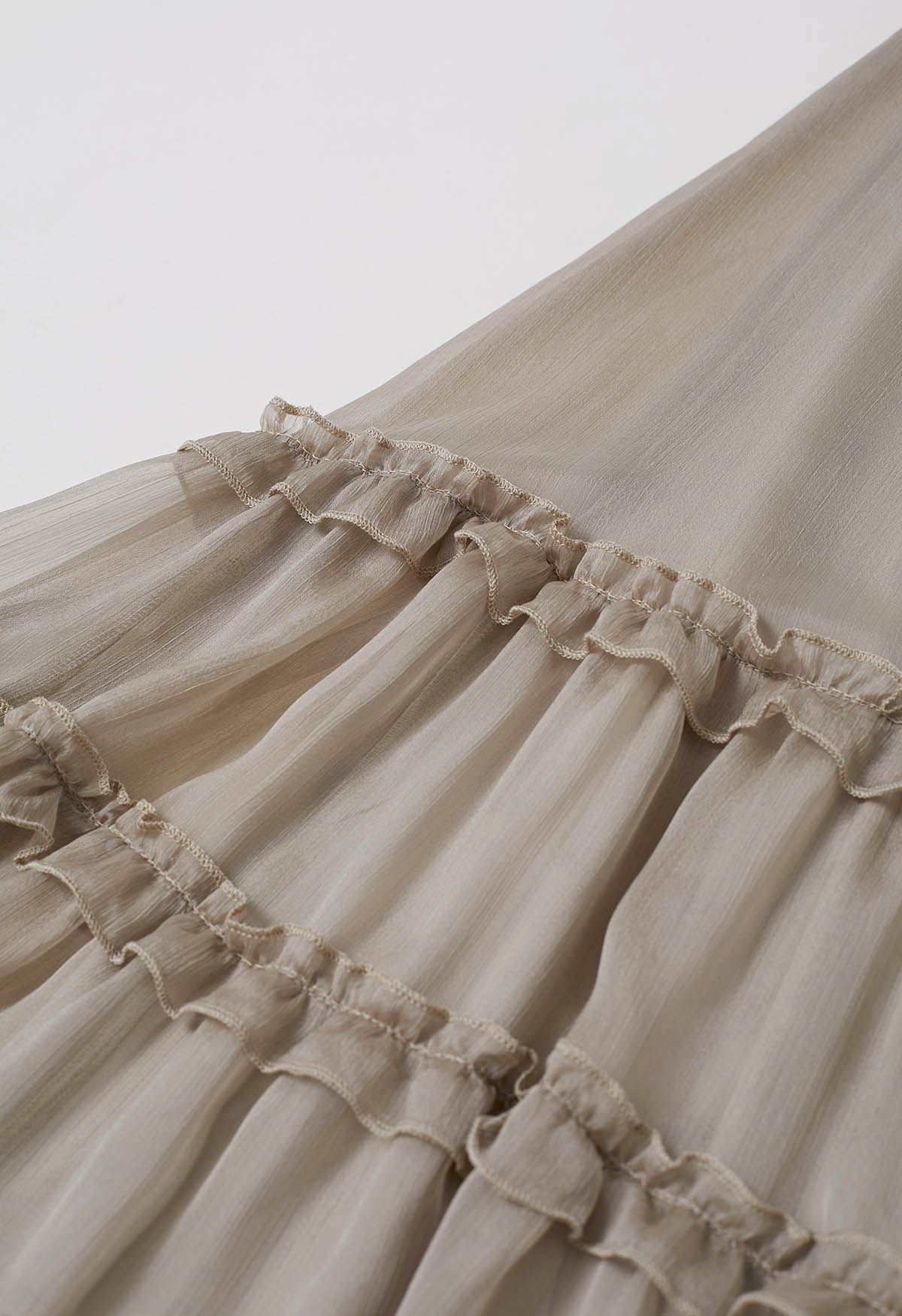 Swirling Ruffle Trim Maxi Skirt in Taupe