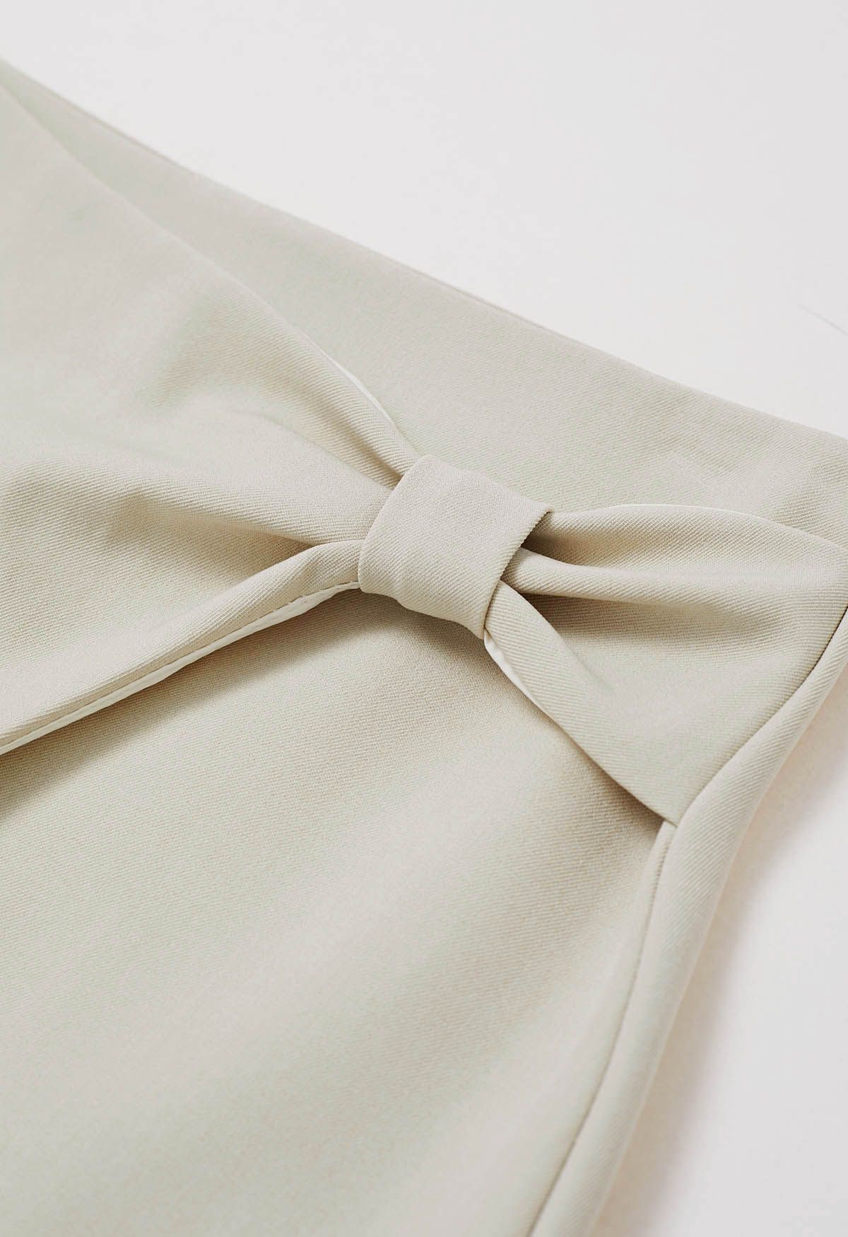 Graceful Bowknot Flap Mini Skirt in Sand