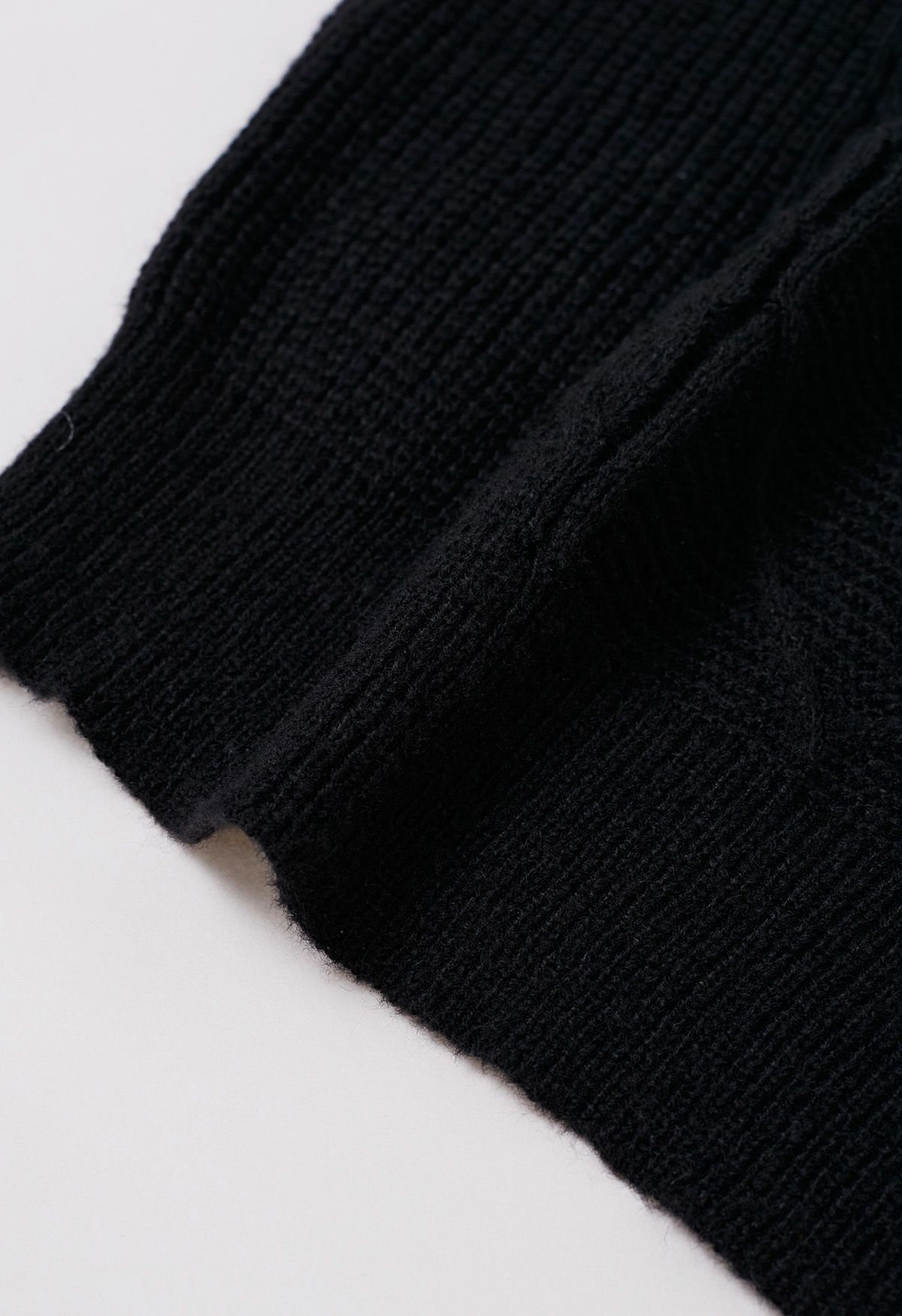 Mock Neck Padded Shoulder Cable Knit Top in Black