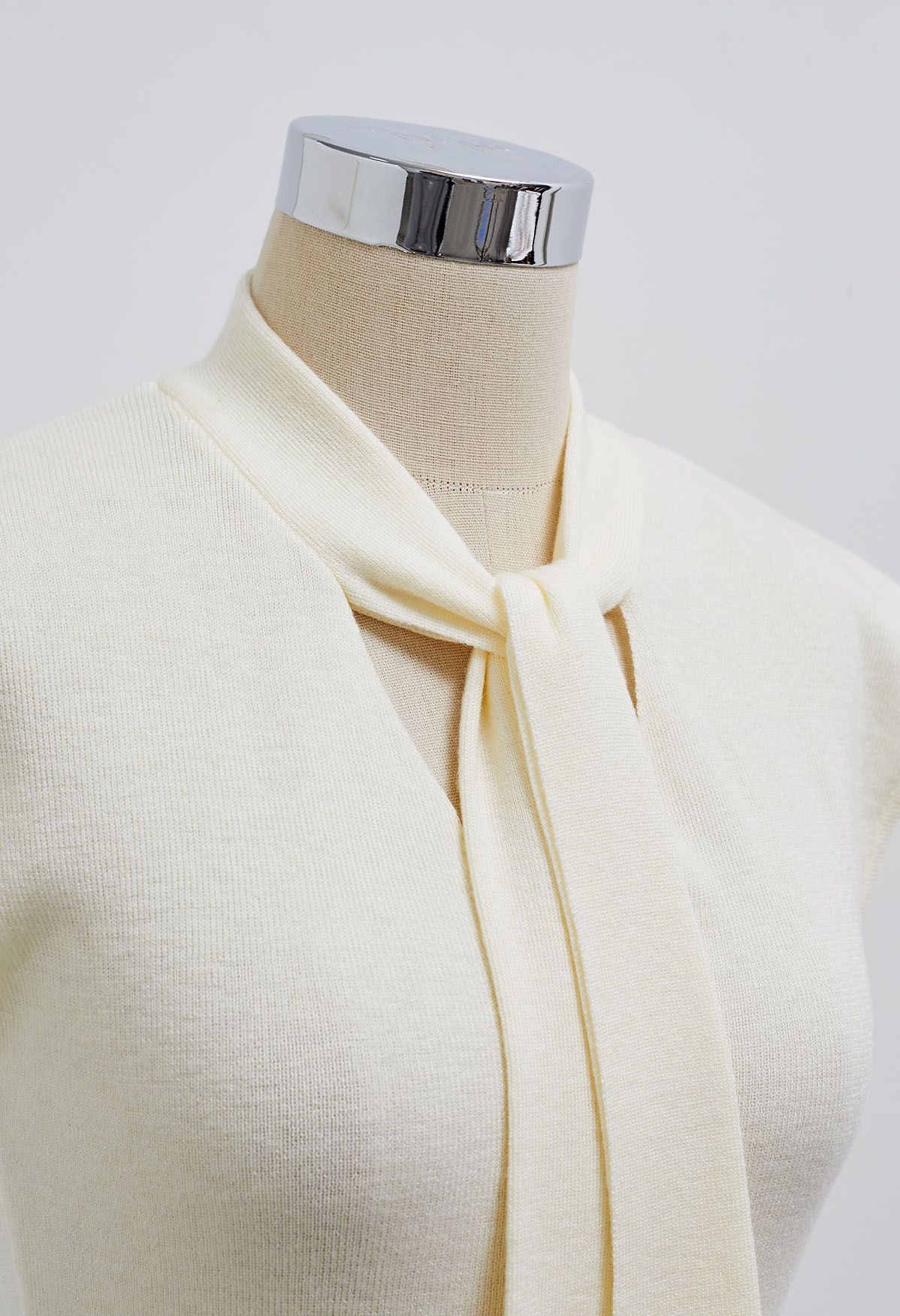 Ribbon-Tied Neckline Cap Sleeve Knit Top in Cream