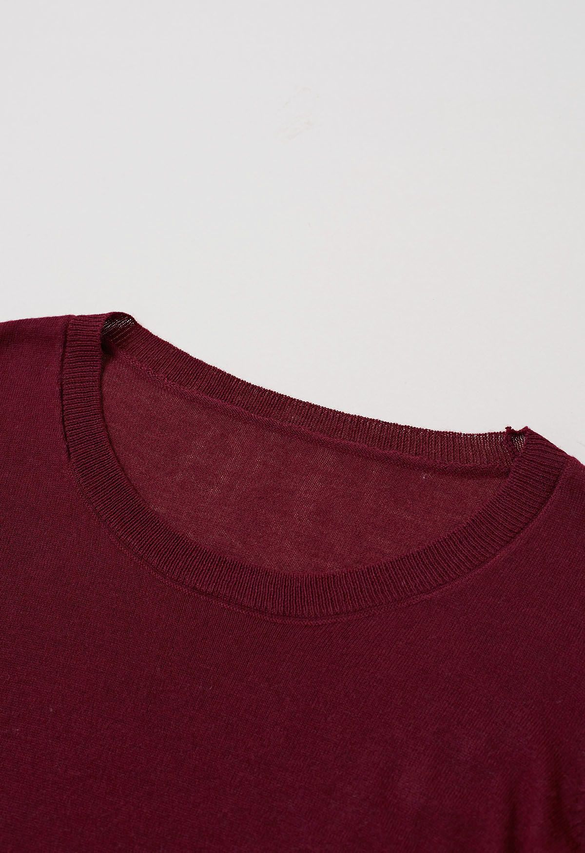 Fascinating Crisscross Buttoned Knit Top in Burgundy