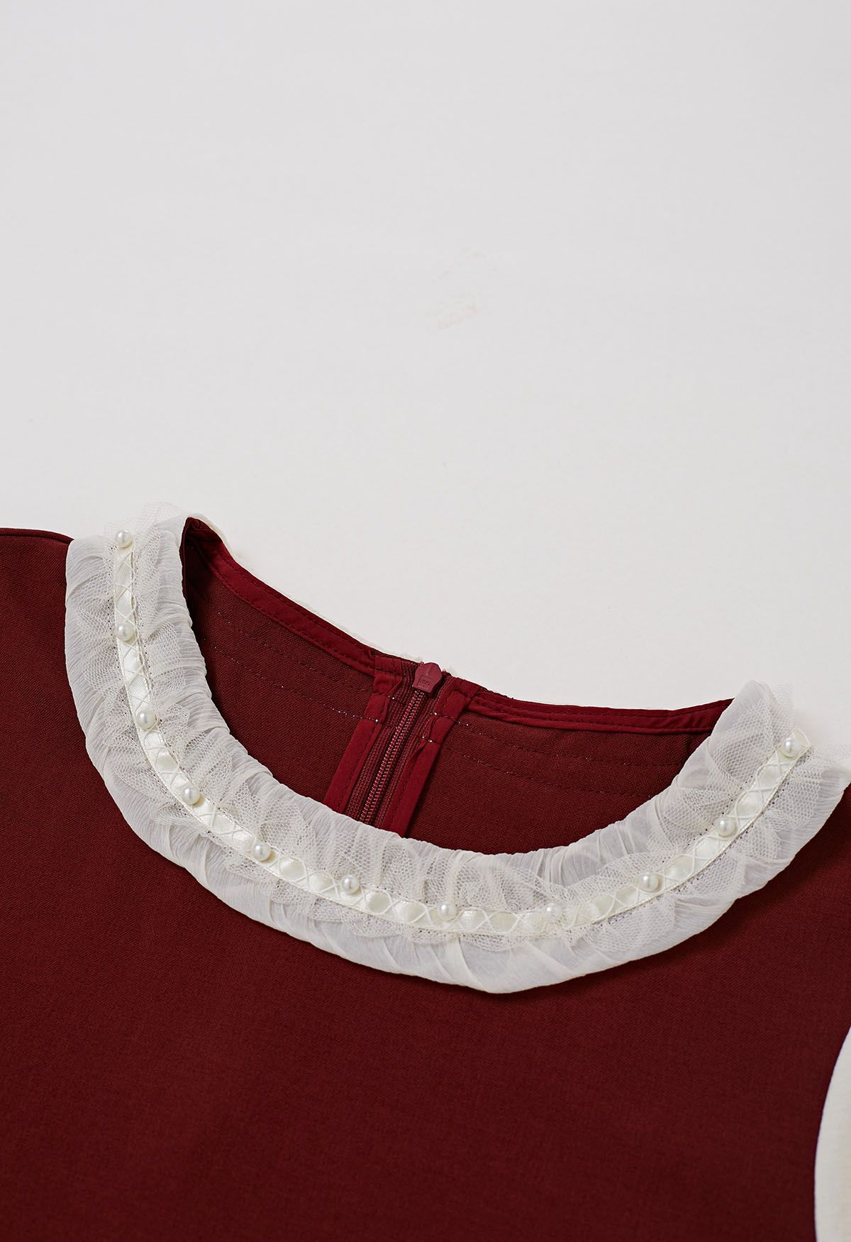 Contrast Pearl Trim Ruffle Neck Flare Cuff Top in Red