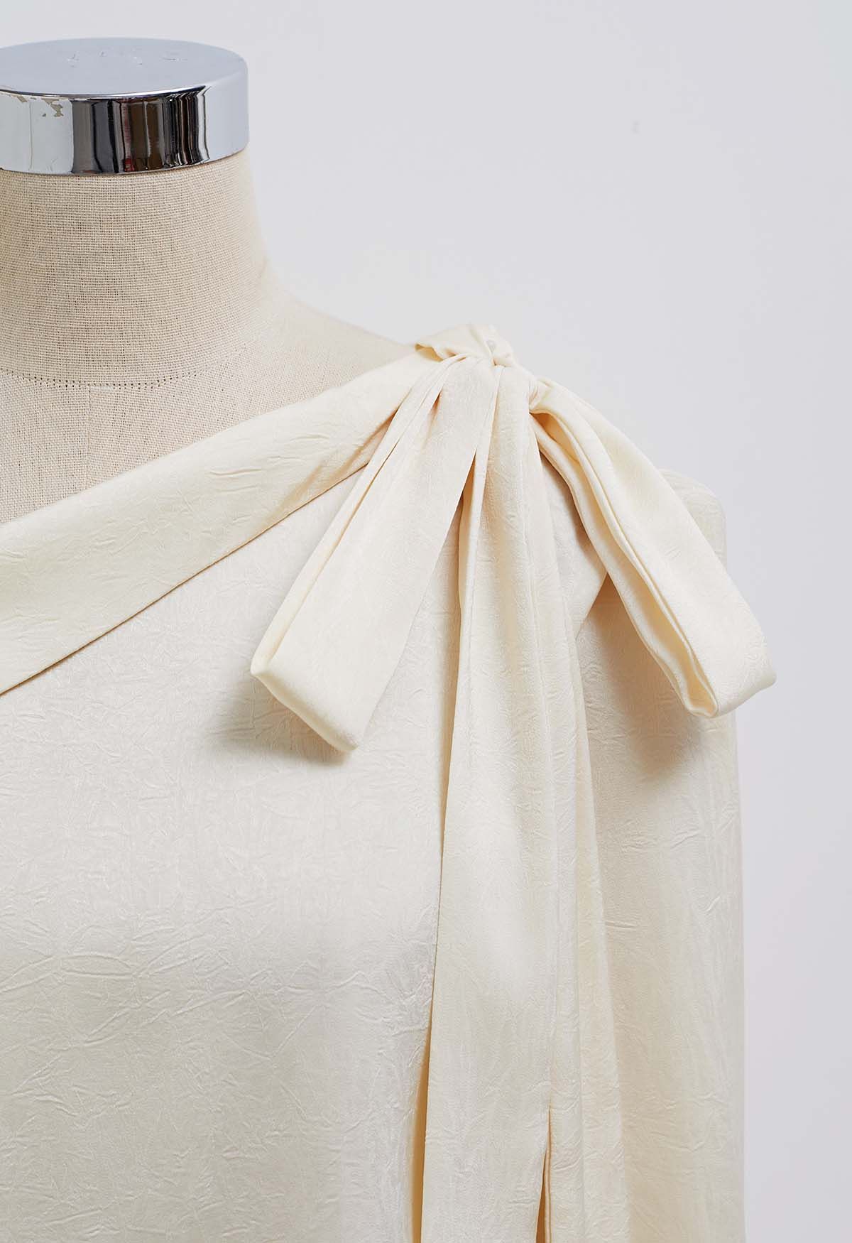 One-Shoulder Bowknot Flap Satin Top in Cream