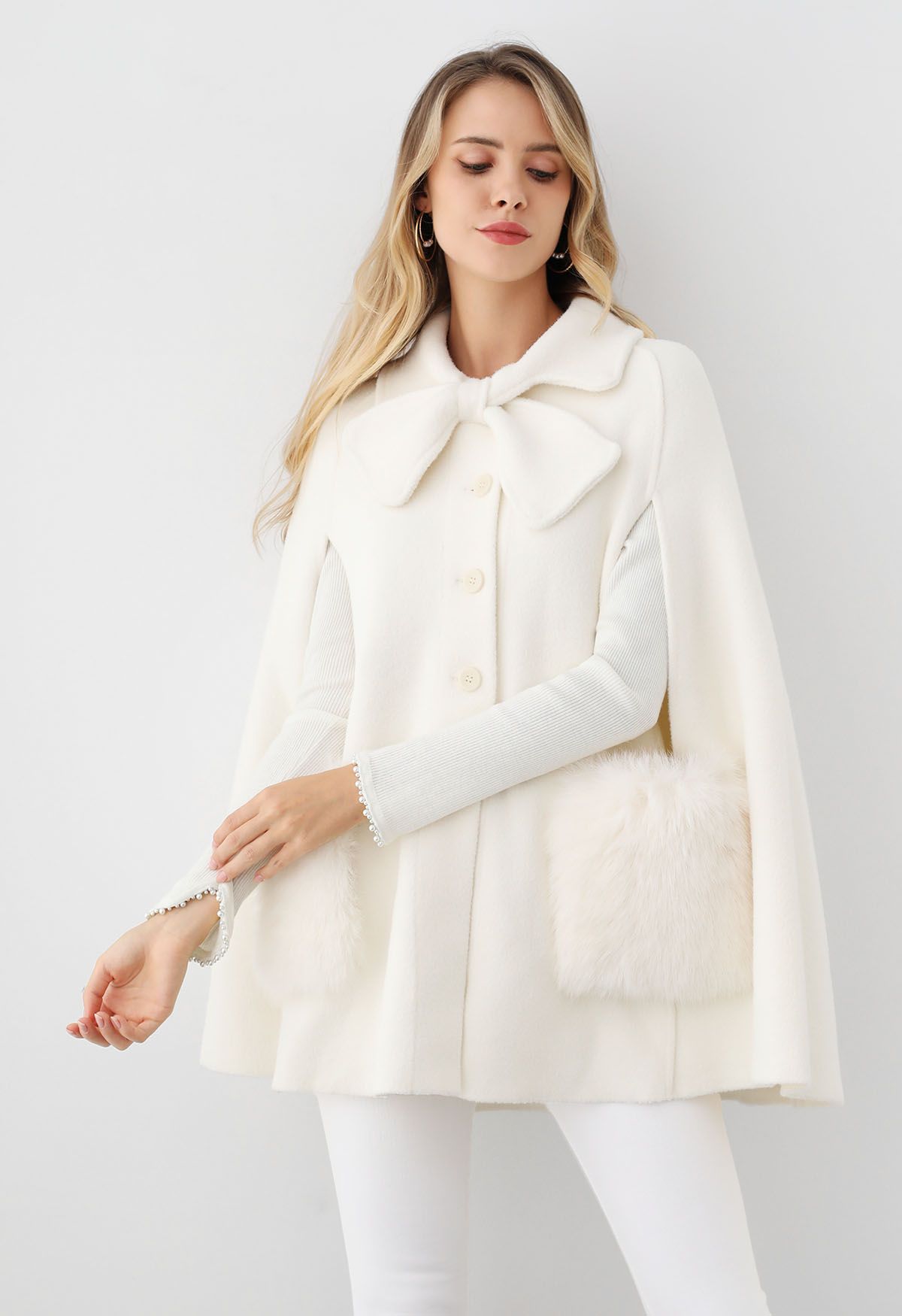 Bowknot Decor Faux Fur Pocket Buttoned Knit Cape Coat in Cream