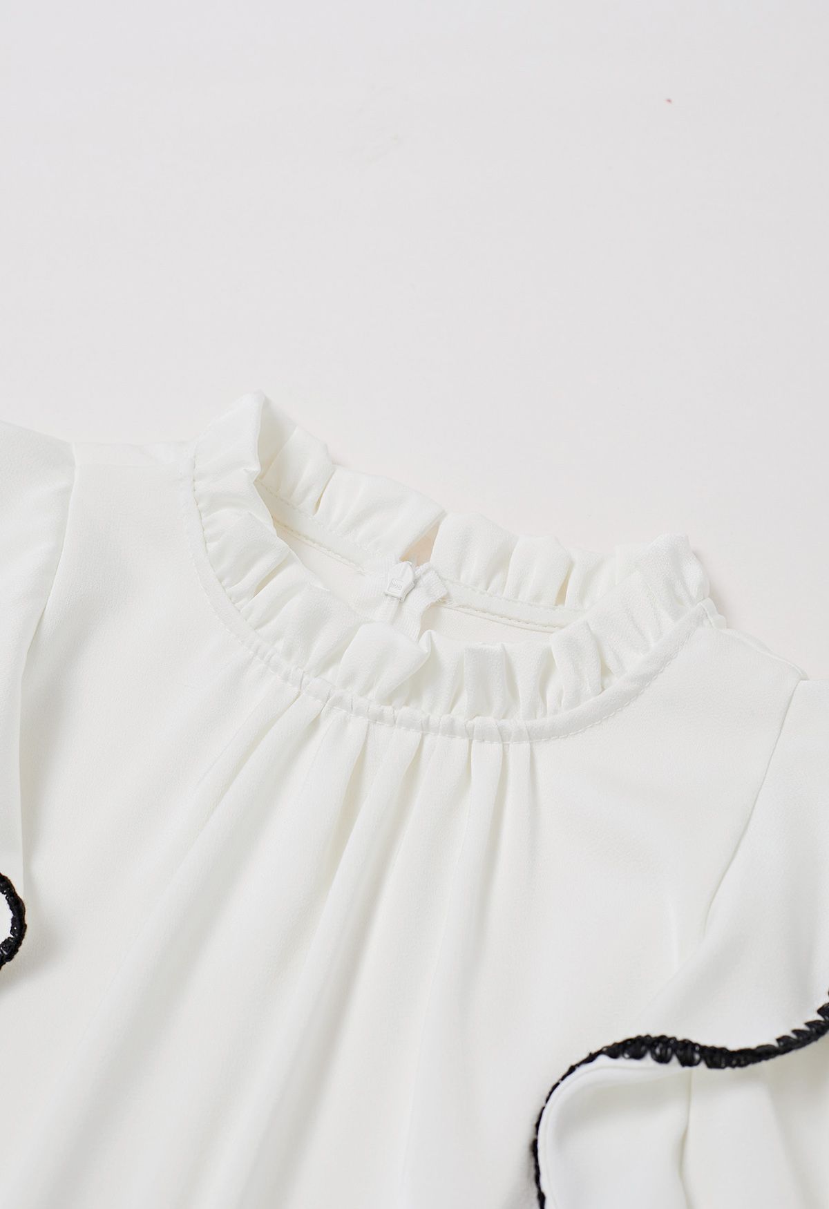 Black Stitch Ruffle Puff Sleeve Shirt in White