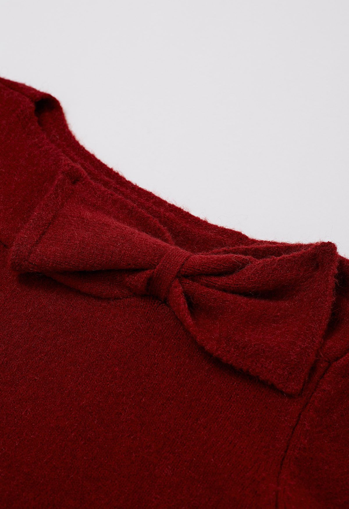 Bowknot-Trimmed Boat Neck Knit Sweater in Red