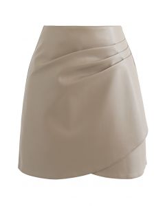 Crisscross Faux Leather Pleated Mini Skirt in Sand